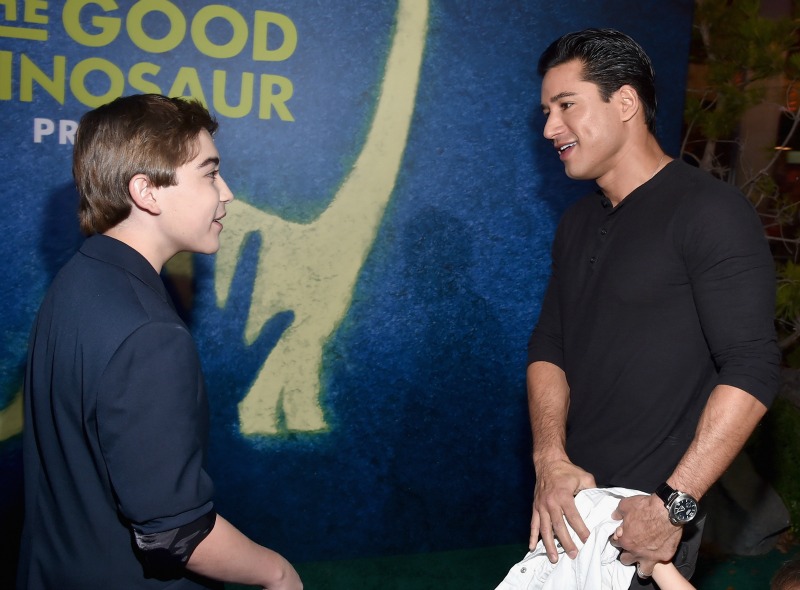 Actors Raymond Ochoa (L) and Mario Lopez attend the World Premiere Of Disney-Pixar's THE GOOD DINOSAUR at the El Capitan Theatre on November 17, 2015 in Hollywood, California. (Photo by Alberto E. Rodriguez/Getty Images for Disney)