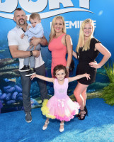 Mixed martial artist Chuck Liddell (L) and family (Photo by Alberto E. Rodriguez/Getty Images for Disney)